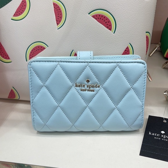 Kate Spade Carey Medium Compartment Bifold Wallet
COLOR: Turquoise
NWT - Picture 15 of 16